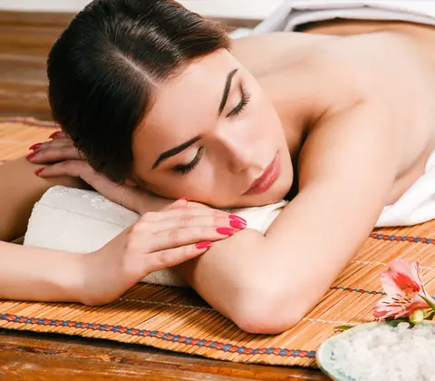 Young woman relaxing at a spa